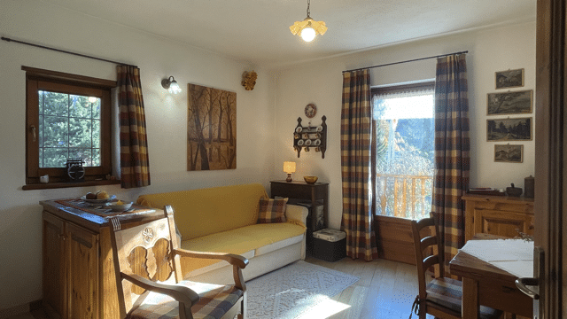 Bilocale integrato nel contesto naturale di Plan